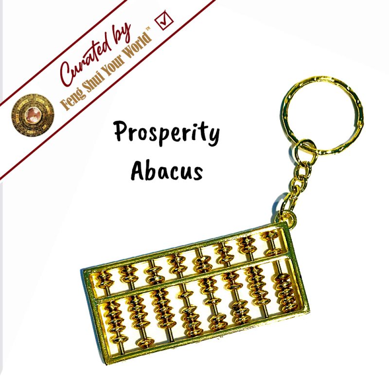 Golden keychain abacus with prosperity theme